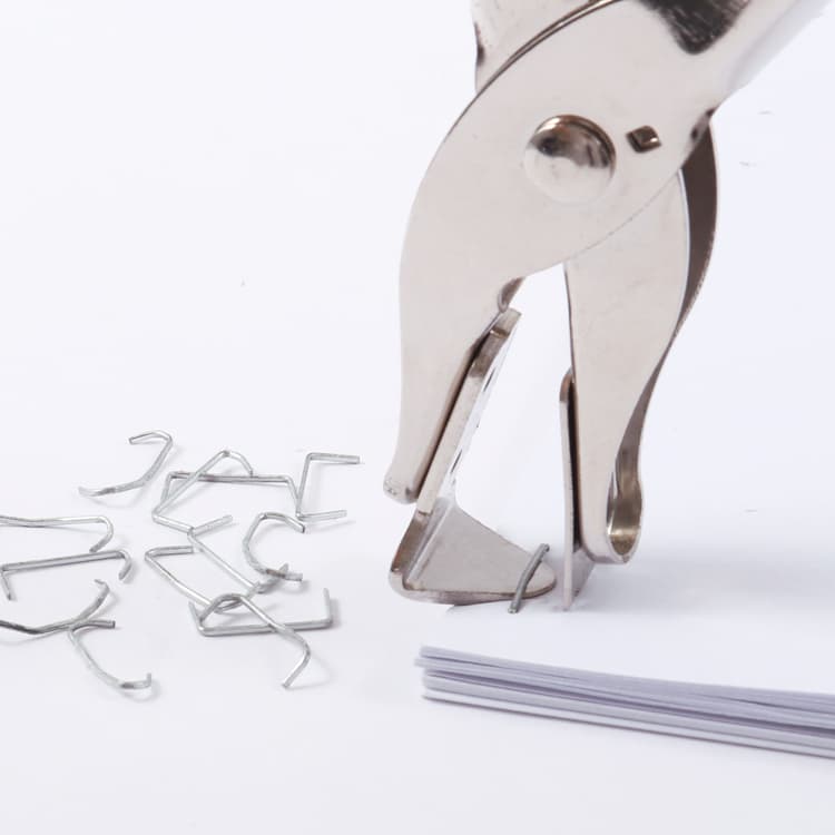 Hand-held staple remover